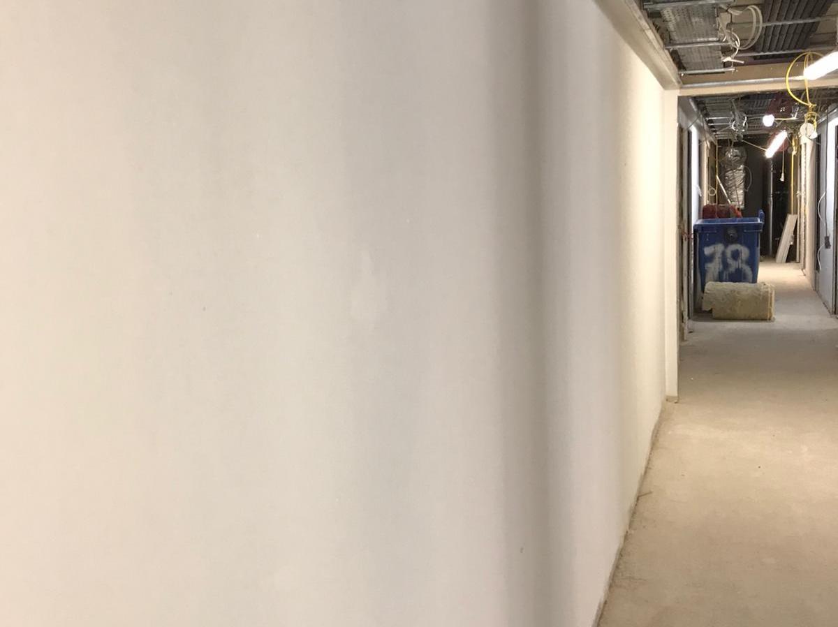 Deniz Contractor providing drylining & drywall contractor work for Hat & Feathers Hotel