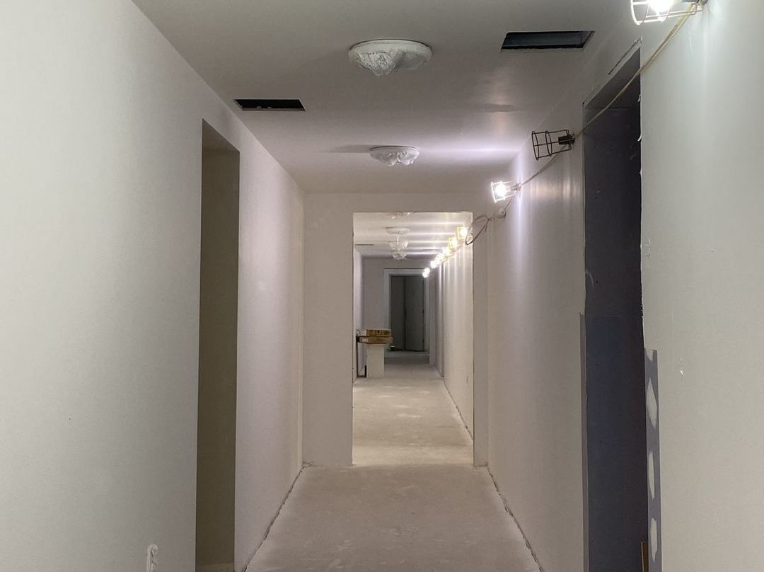 Deniz Contractor providing drylining & drywall contractor work for 100 violet road